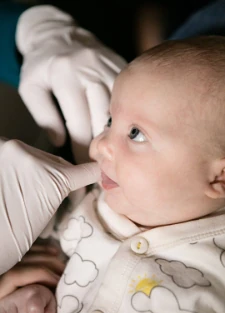 A baby in a craniosacral therapy session