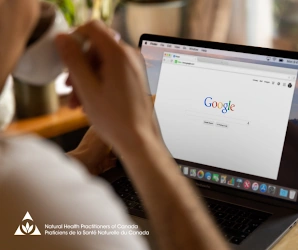 Someone looking at a computer screen featuring Google.