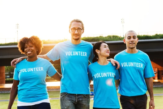 A group of volunteers in matching shirts. 