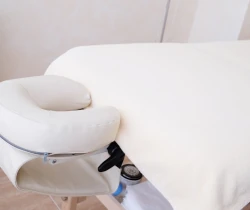 An empty massage table. 