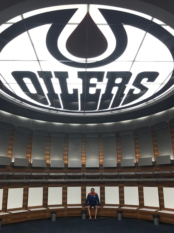 NHPC Massage Therapist Stephen Lines Under Oilers Logo