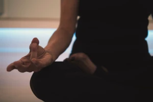 Close-up of practitioner in lotus position